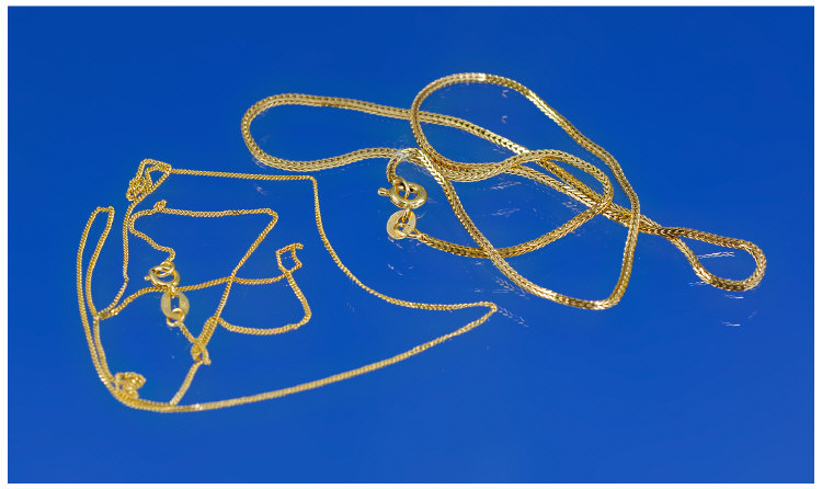 Appraisal: Two Gold Chains An Elegant Italian Eighteen Carat Gold Chain