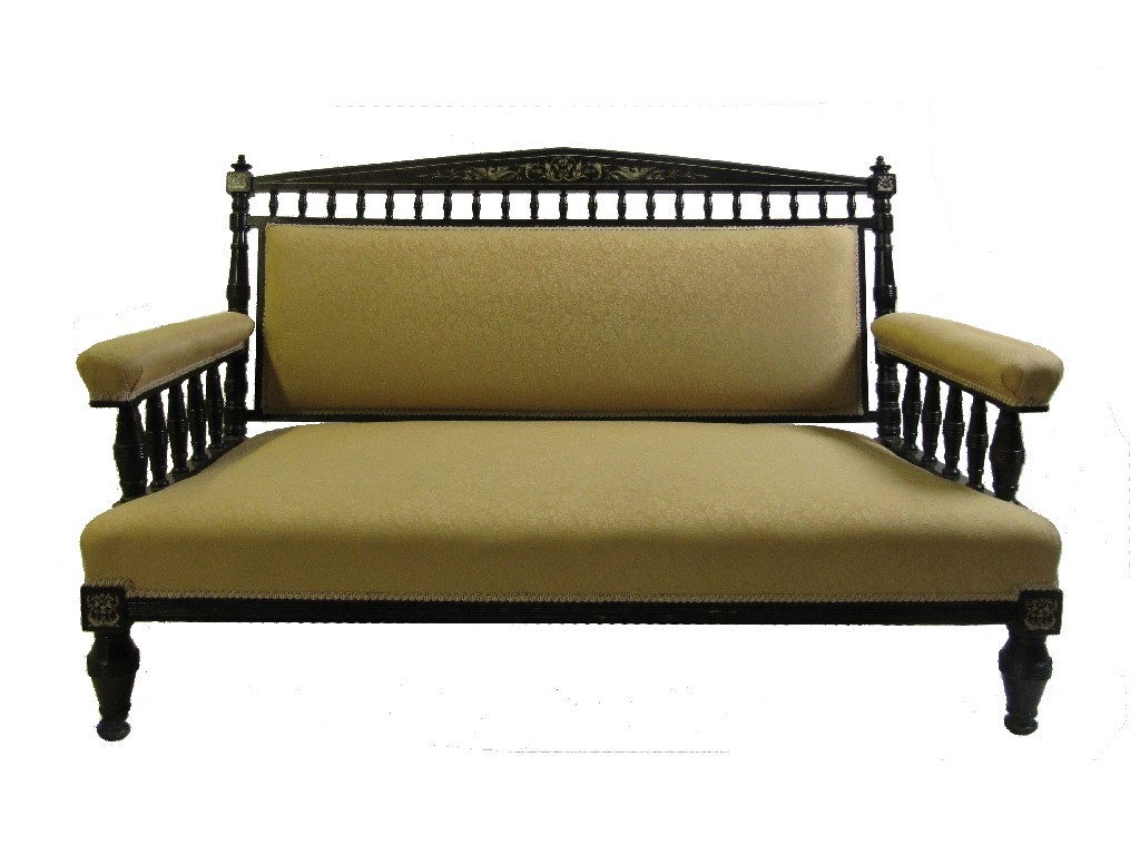 Appraisal: A Late Victorian ebonised parlour suite nine pieces comprising settee