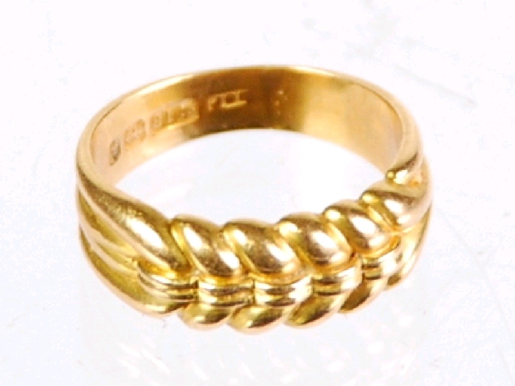 Appraisal: VICTORIAN ct GOLD RING with plaited top fluted shoulders and