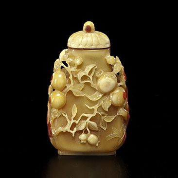 Appraisal: Chinese th century A hornbill snuff bottle with a surface