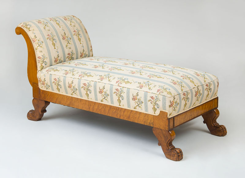 Appraisal: BIEDERMEIER BIRD'S EYE MAPLE AND MAHOGANY CHAISE LOUNGE With an