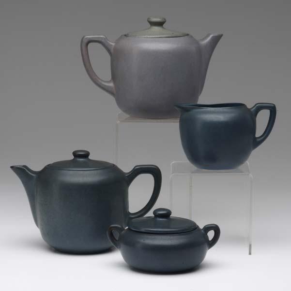 Appraisal: MARBLEHEAD Four tea items two tea pots a sugar and