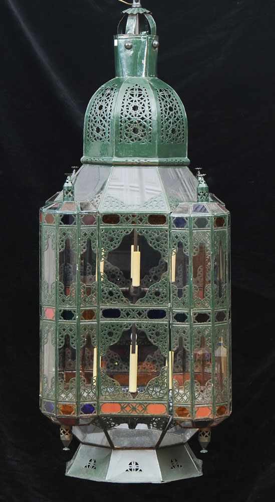 Appraisal: MOROCCAN PAINTED T LE AND GLASS EIGHT-LIGHT CHANDELIER With a