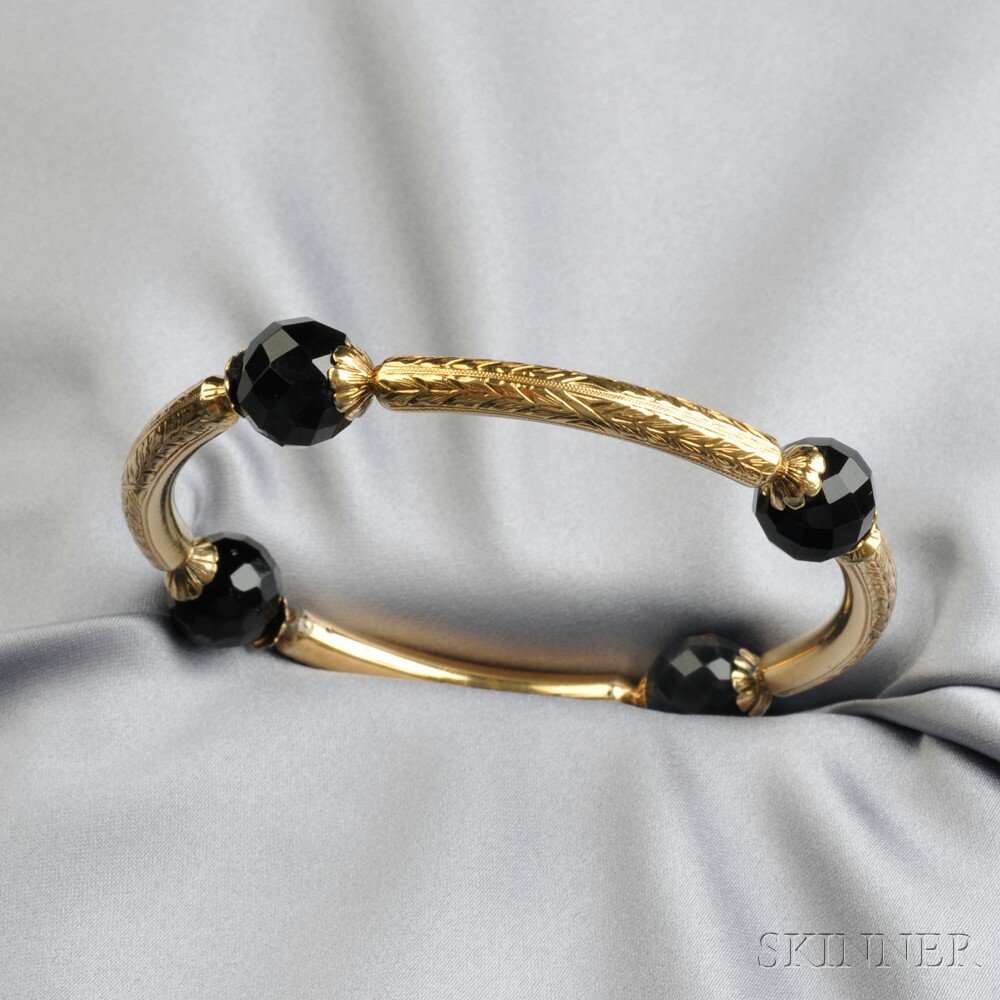 Appraisal: kt Gold and Onyx Armlet Austria with four faceted onyx