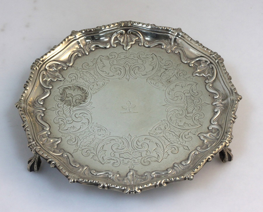 Appraisal: A Victorian silver salver Sheffield with embossed pie crust border