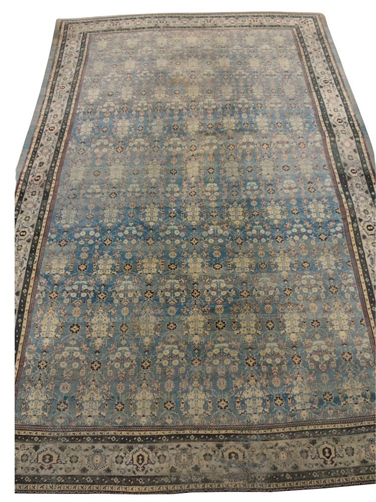 Appraisal: Agra Oriental Carpet having pale blue field ' x '