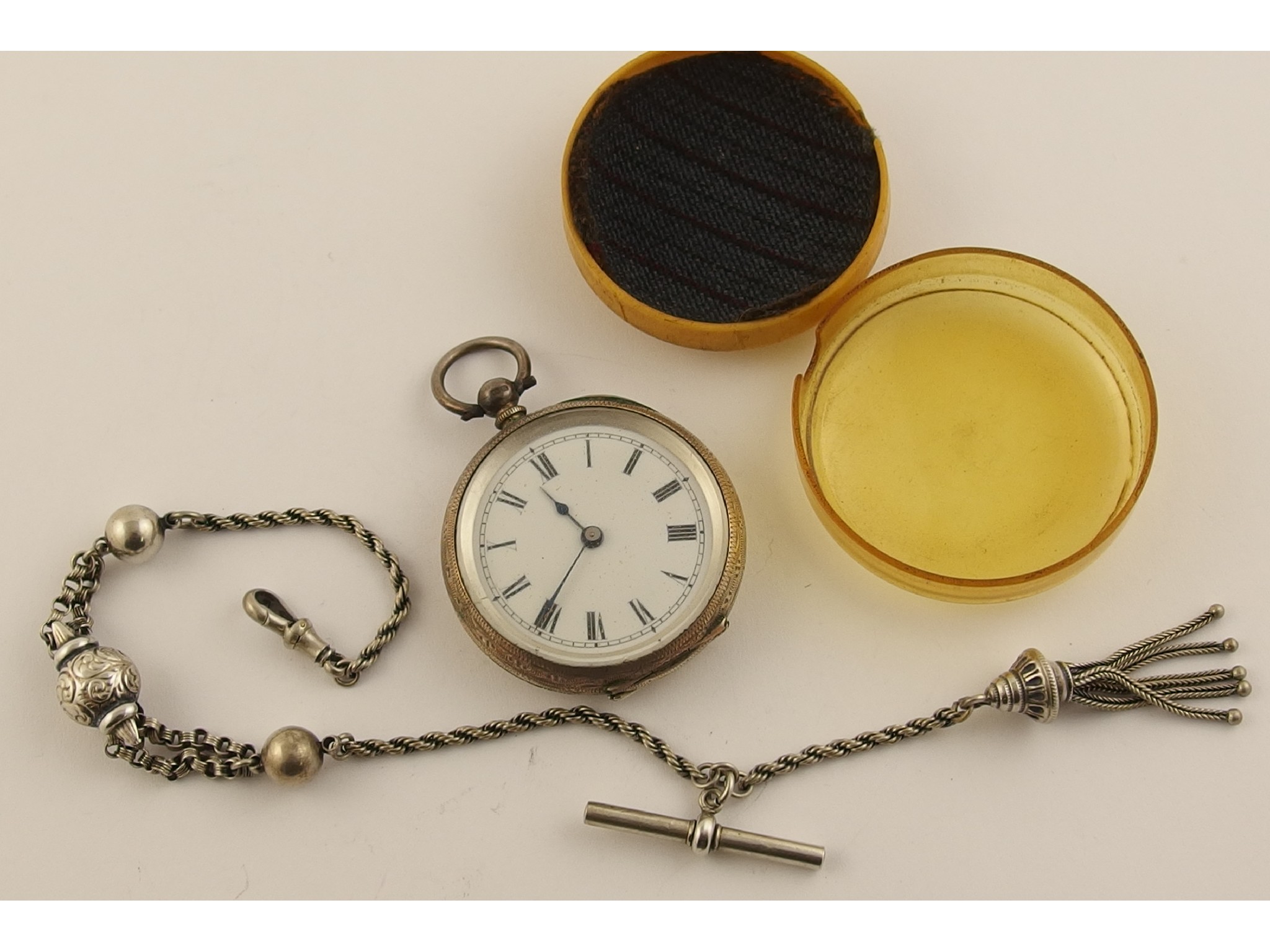 Appraisal: A small silver pocket watch approx mm diameter and a