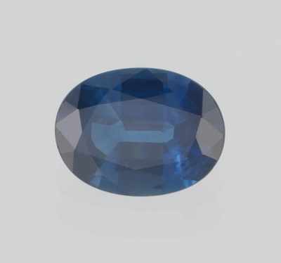 Appraisal: An Unmounted Blue Sapphire UGL Report Oval mixed cut weighting