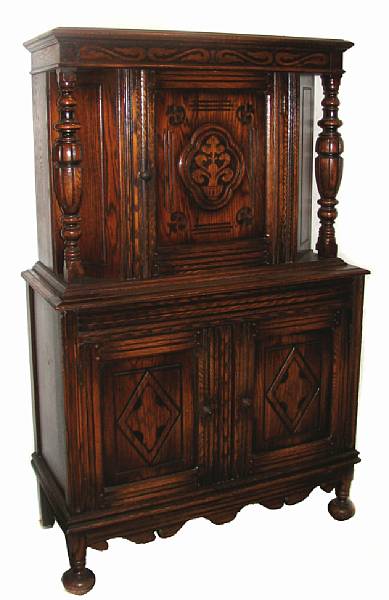 Appraisal: An Elizabethan style oak court cupboard height ft in width