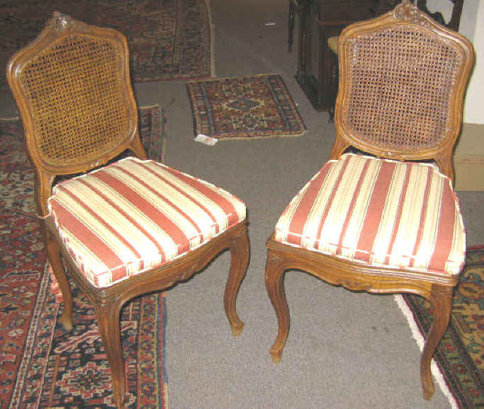 Appraisal: FOUR LOUIS XV STYLE CANE BACK SIDE CHAIRS Scrolling cartouche