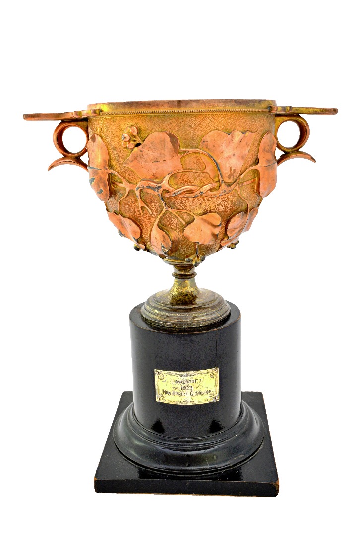 Appraisal: A Victorian silver gilt twin handled trophy cup modelled as