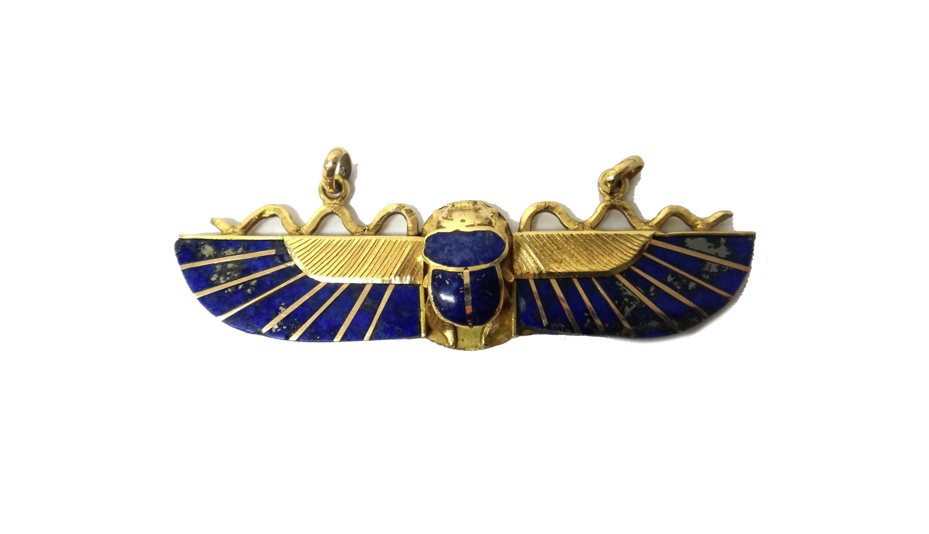 Appraisal: An Egyptian gold and lapis lazuli pendant formed as a