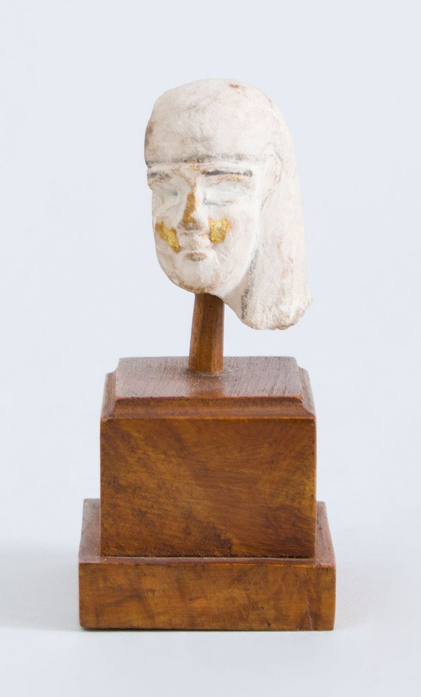 Appraisal: EGYPTIAN CARVED LIMESTONE HEAD OF A MAN x x in