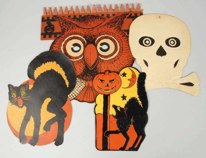 Appraisal: Lot of Cardboard Halloween Die-Cuts Description Includes one owl mask