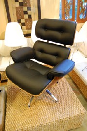 Appraisal: BLACK EAMES STYLE LOUNGE CHAIR WITH MATCHING OTTOMAN