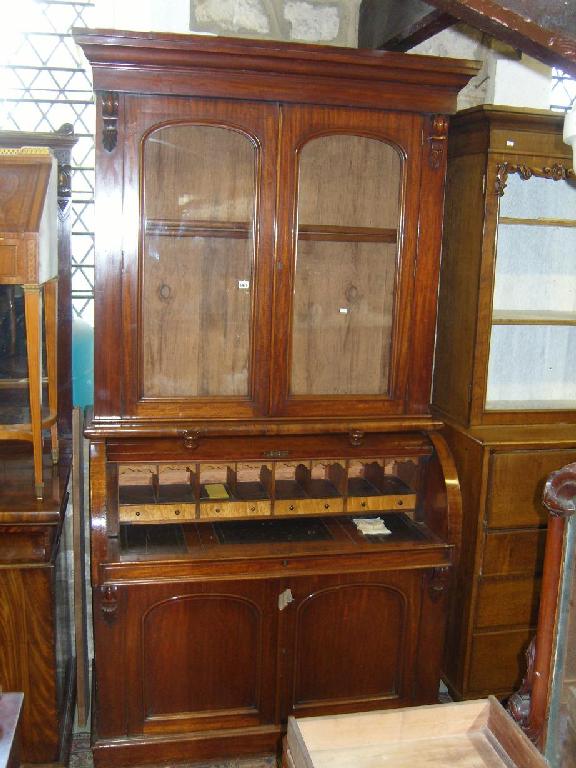 Appraisal: A substantial Victorian mahogany bureau bookcase the upper section enclosed