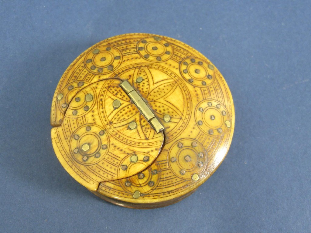 Appraisal: A th Century circular horn Snuff Box with engine turning