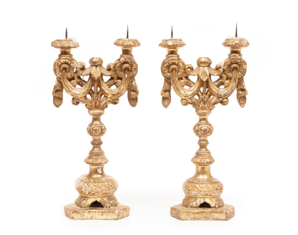 Appraisal: Pair of Italian Giltwood Two-Light Prickets th c carved tassels