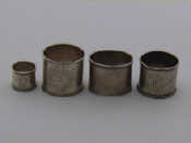 Appraisal: Four Russian silver napkin rings with beaded edges comprising one