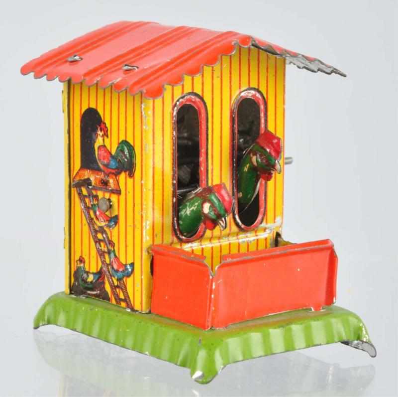 Appraisal: Tin Litho Chicken Coop Penny Toy German Crank-operated Chickens peck