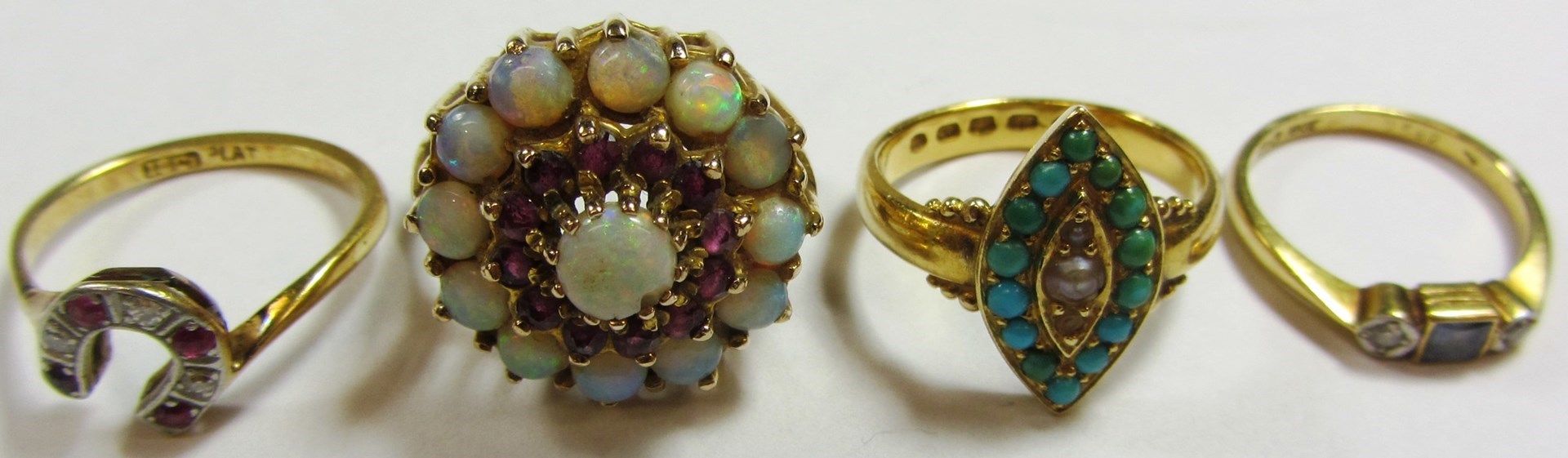 Appraisal: A gold turquoise and half pearl set marquise shaped cluster