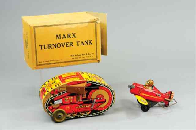 Appraisal: MARX ROLLOVER TANK AND AIRPLANE Both lithographed tin turn-over featured