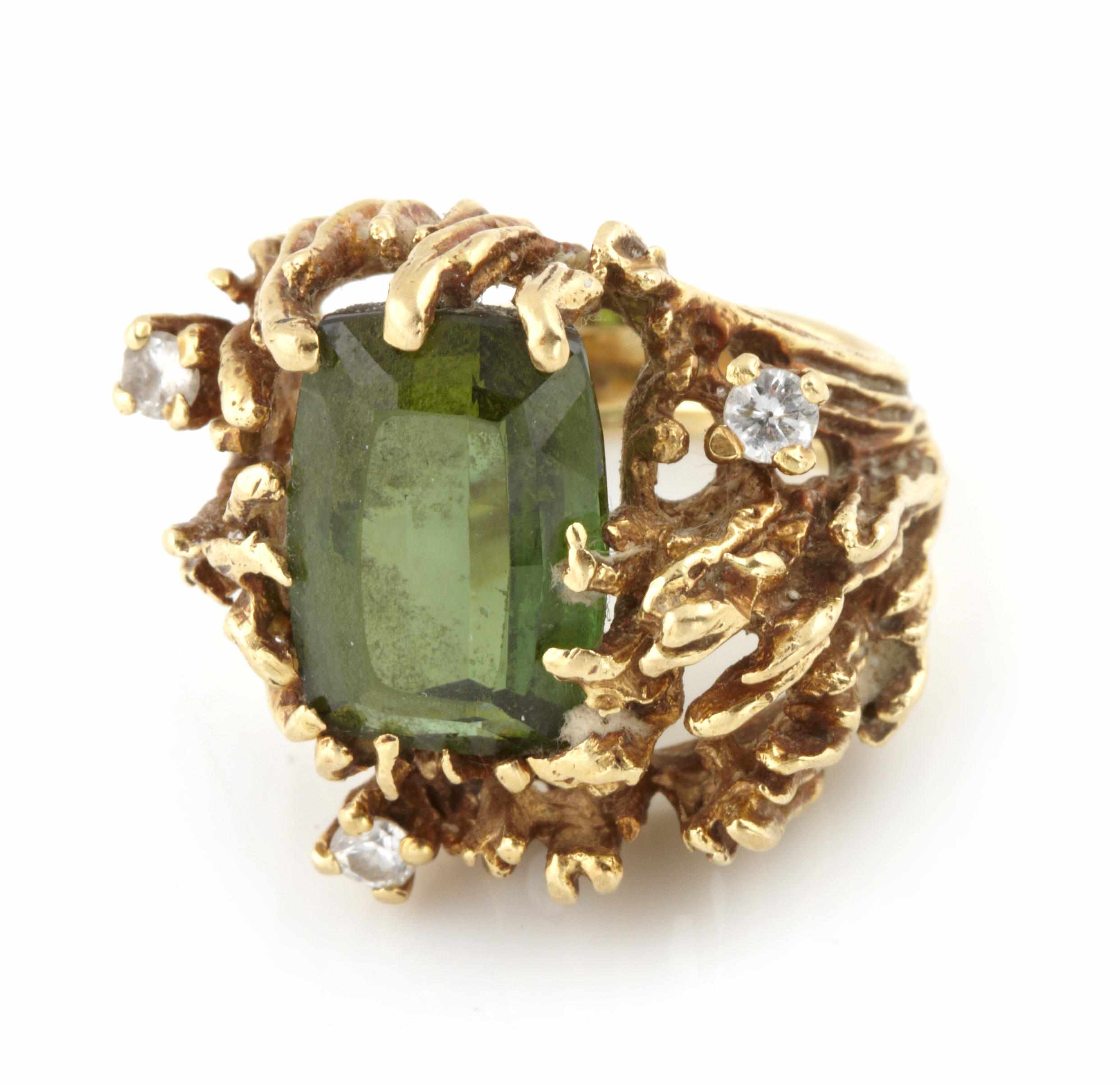 Appraisal: A peridot diamond and gold ring size