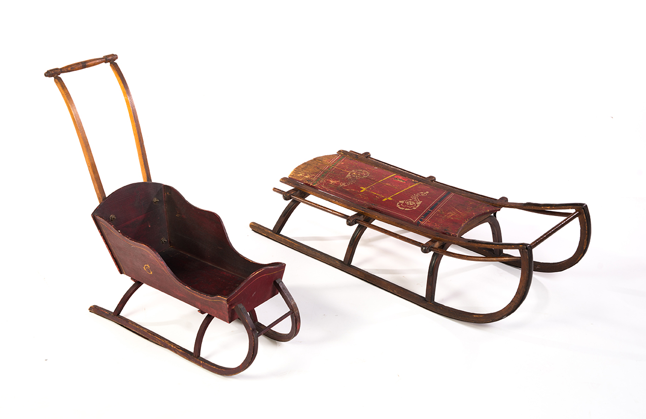 Appraisal: TWO WINTER-THEMED CHILDREN'S ITEMS American ca Painted child's sled with