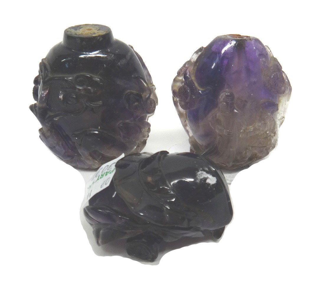 Appraisal: Two amethyst snuff bottles and an amethyst pendant th century