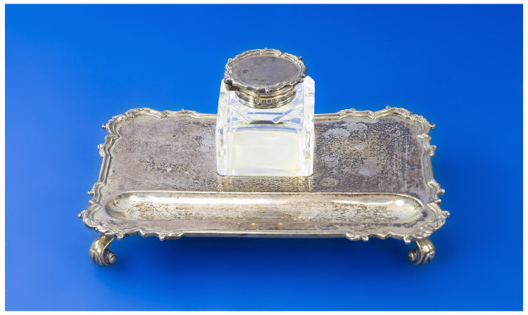 Appraisal: A Silver Four Footed Tray with Pen Channel and Recess