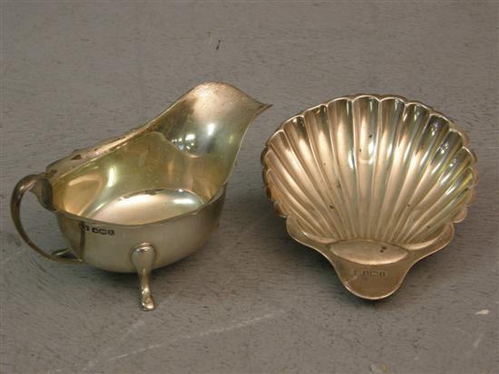 Appraisal: George V Silver Sauce Boat Sheffield and a silver shell