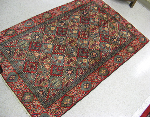 Appraisal: TWO PERSIAN REPEATING PANEL AREA RUGS ' x ' Shiraz