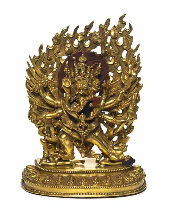 Appraisal: A Southeast Asian Gilt Bronze Figure of a Deity depicting