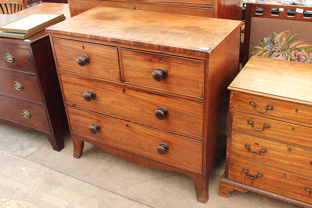 Appraisal: A VICTORIAN MAHOGANY CHEST of two short and two long