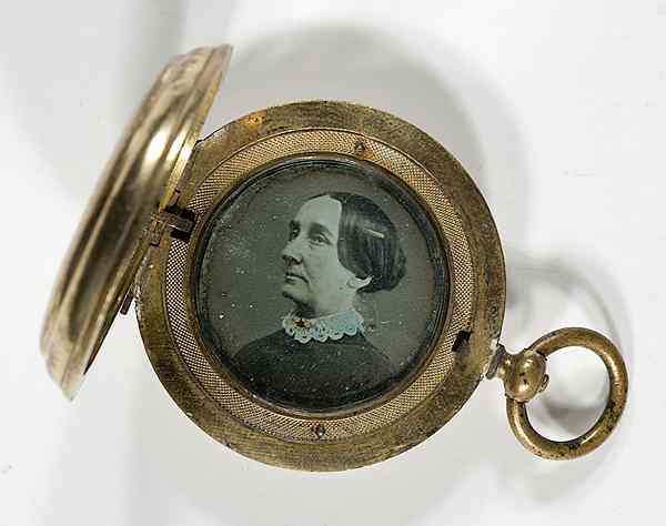 Appraisal: Daguerreian Double-Sided Locket Featuring Portrait in diameter gold-filled double-sided locket