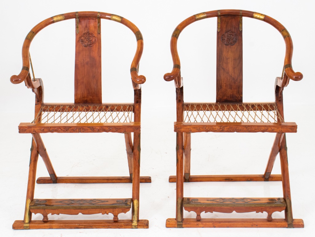 Appraisal: CHINESE HONGMU WOOD QUANYI FOLDING CHAIRS PAIR Chinese brass-mounted Hongmu