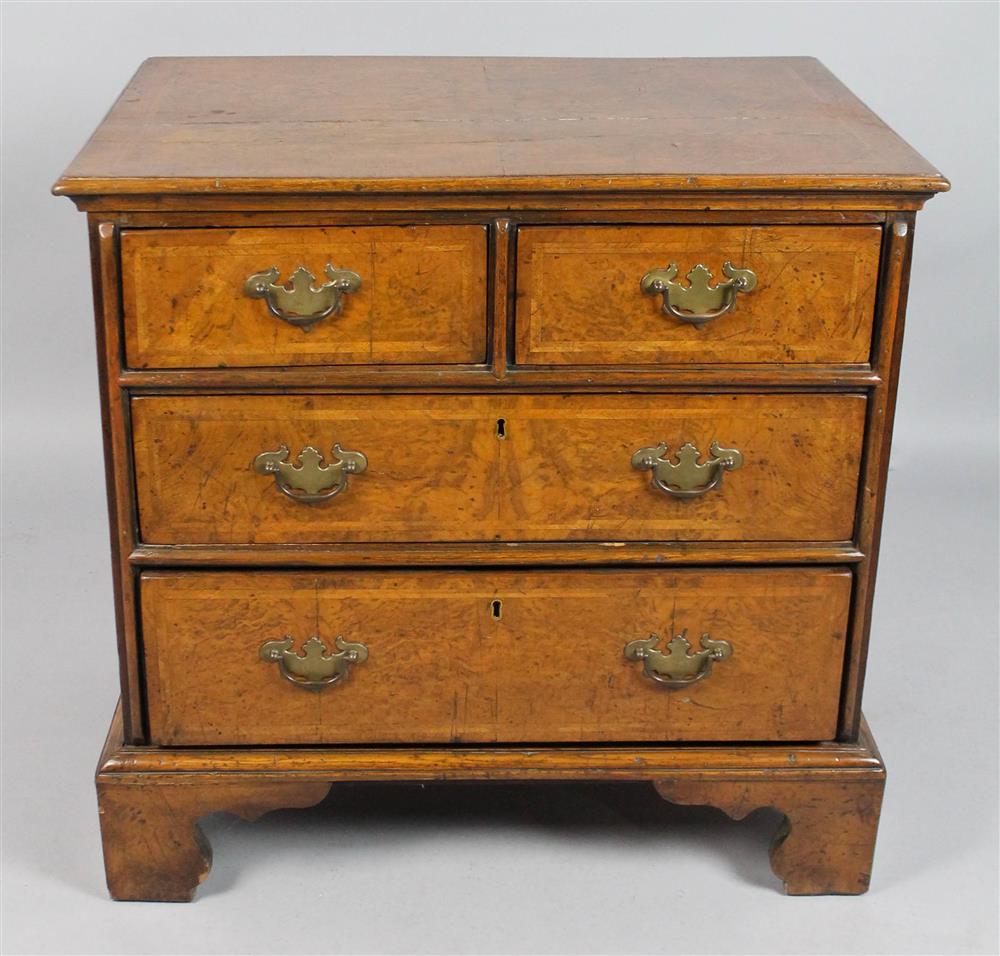 Appraisal: GEORGE II INLAID WALNUT BACHELOR CHEST having a nicely figured