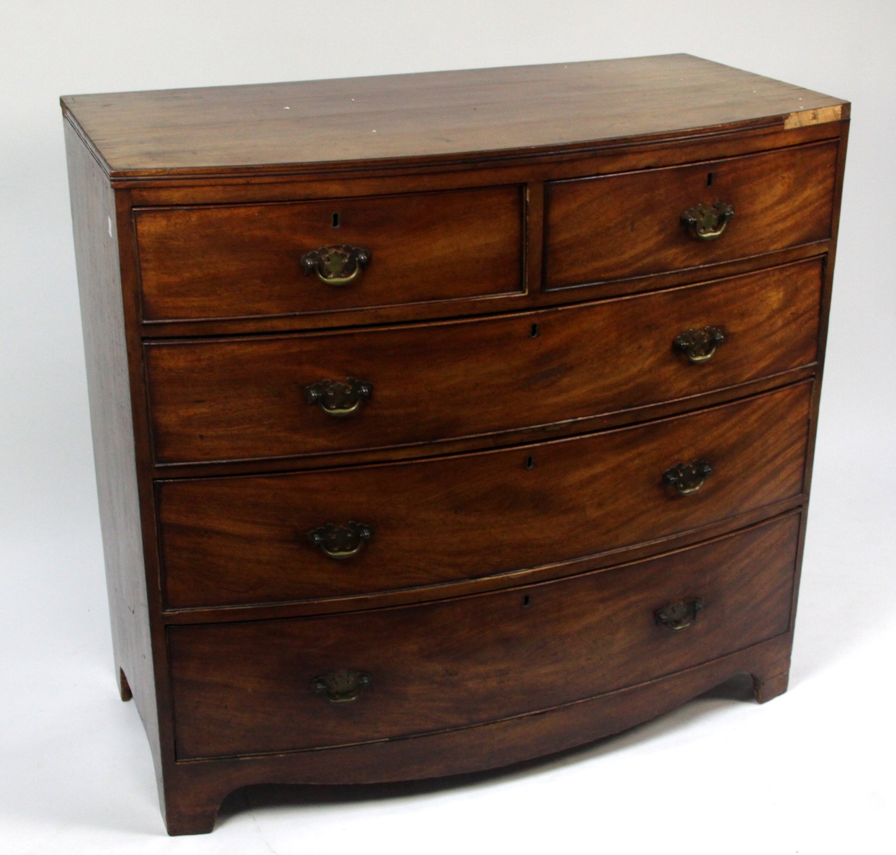 Appraisal: An early th Century mahogany bow fronted chest of two