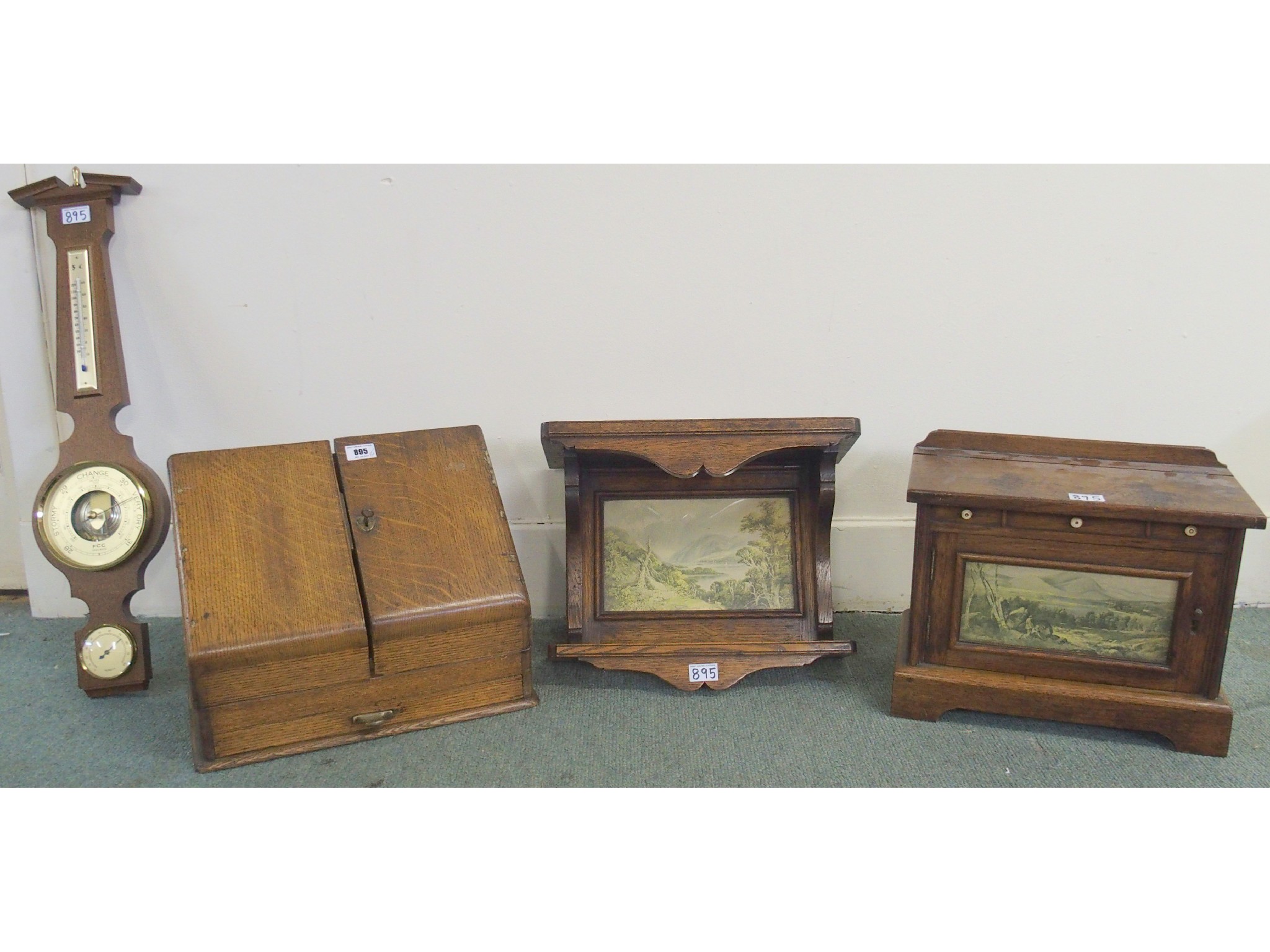 Appraisal: An oak stationery box modern barometer oak shelf and another