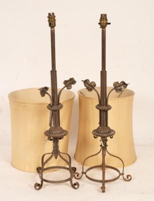 Appraisal: Two steel telescopic table lamps with leaf decoration on four