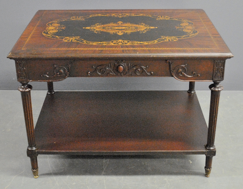 Appraisal: - Carved and inlaid mahogany library table in the manner