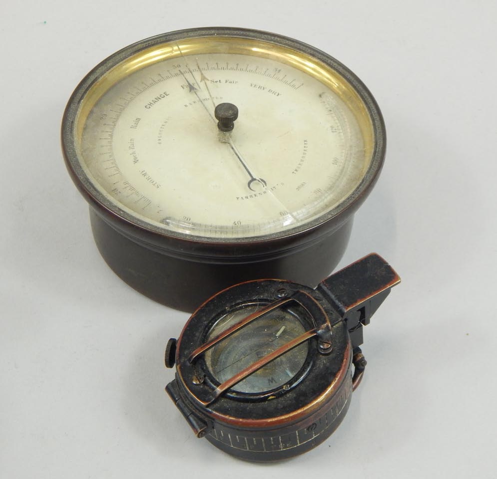 Appraisal: A War issue miniature or pocket compass the cm diameter