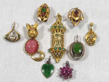 Appraisal: A mixed lot comprising three gold pendants four silver pendants