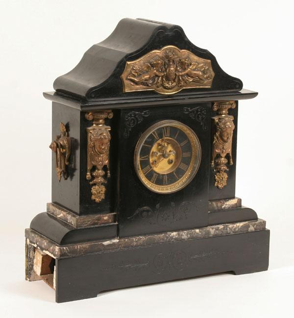 Appraisal: Massive mantle clock ebonized marble surface domed top brass classical