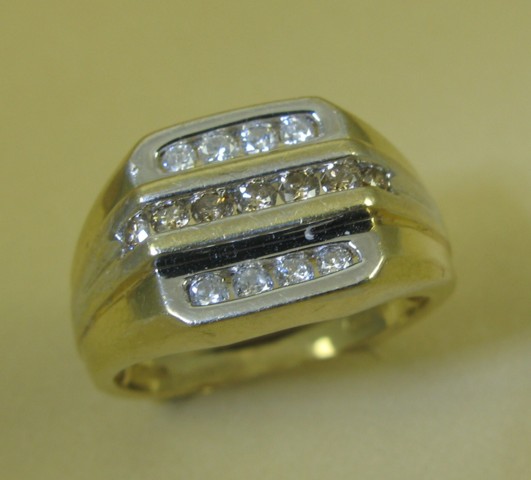 Appraisal: DIAMOND AND FOURTEEN KARAT GOLD RING set with three parallel