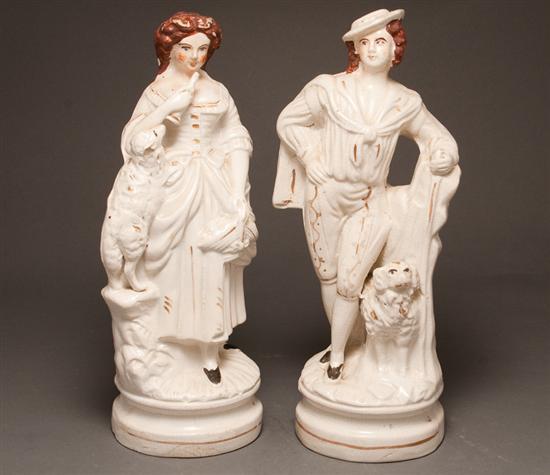 Appraisal: Pair of Staffordshire earthenware figures of an th century man