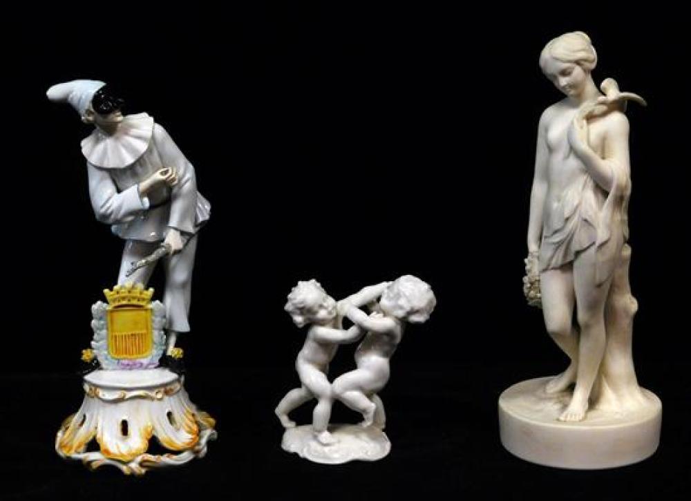 Appraisal: Three ceramic figurines th C including a Parian maiden holding