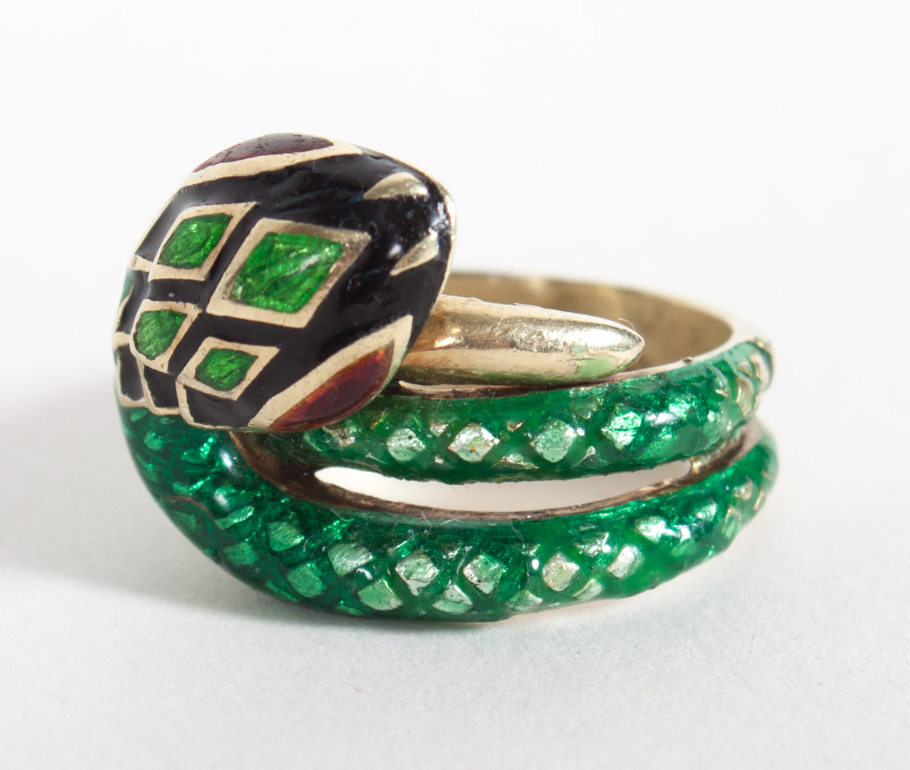 Appraisal: Martine K gold and enamel snake form ring size grams