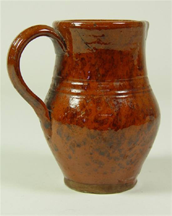 Appraisal: American Earthenware Pitcher th Century Speckled manganese with slight dripping