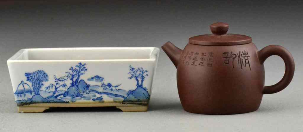 Appraisal: Chinese Yixing Pottery Tea Pot PlanterTo include a yixing tea